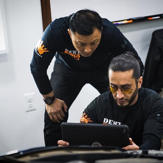 DentKings technician working on a panel